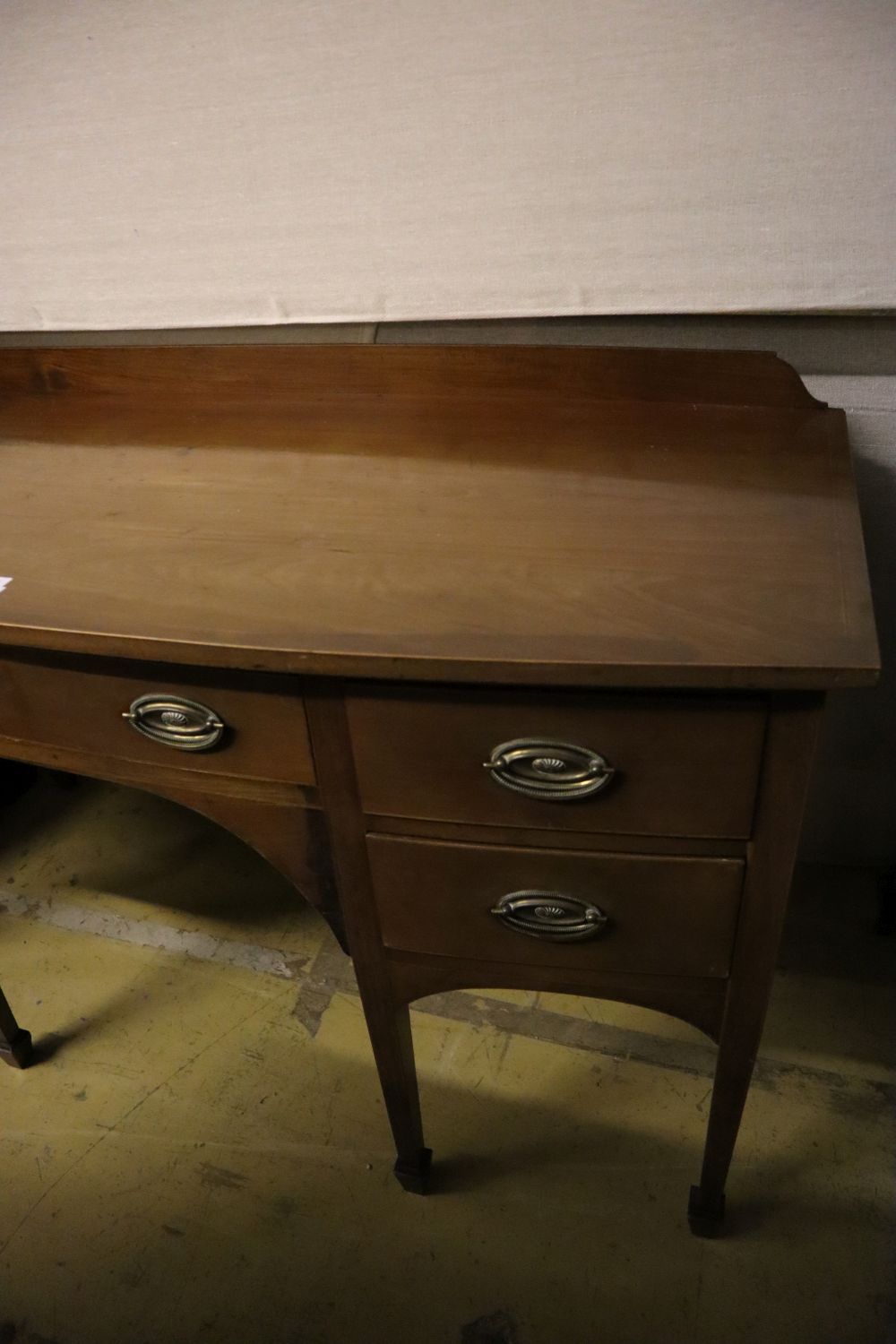 A George III mahogany bow fronted sideboard, width 137cm depth 67cm height 84cm